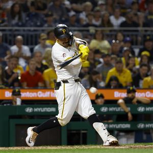 The Pirates' Nick Gonzales hits an RBI single in the eighth inning Monday against the St. Louis Cardinals at PNC Park.