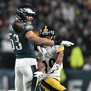 Pittsburgh Steelers wide receiver Calvin Austin III (19) catches the ball against Philadelphia Eagles linebacker Zack Baun (53) during the second half of an NFL football game, Sunday, Dec. 15, 2024, in Philadelphia. 