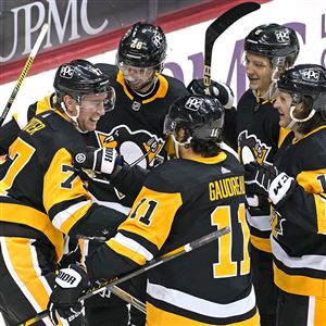 Carter, Lagace help Penguins beat Sabres, clinch 1st in East