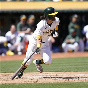 Oakland Athletics' Tristan Gray hits a single against the Detroit Tigers during the fourth inning of a baseball game on Saturday, Sept. 7, 2024, in Oakland, Calif.