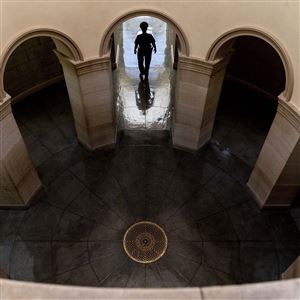 An officer walks in a hallway just off the Rotunda of the U.S. Capitol on Sept. 29 in Washington. About 4 million federal workers, from FBI agents to Bureau of Prisons guards to U.S. Food and Drug Administration workers, are to be vaccinated by Nov. 22 under the president’s executive order aimed at stopping the spread of the coronavirus. 