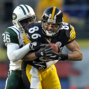 Pittsburgh Steelers' Hines Ward (86) laughs before taking on the