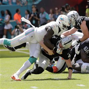 Mel Blount and Ike Taylor have some advice for Artie Burns