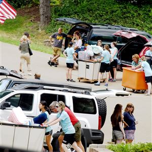 Carts were on the move while over 1,550 freshmen and their families are expected during move-in day at Duquesne University.