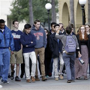 A group tours the campus at Stanford University.