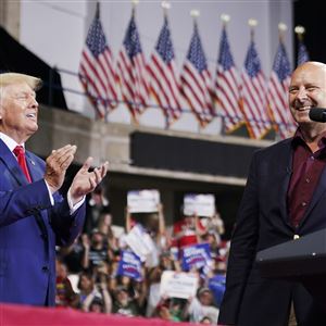 Former President Donald Trump, left, is joined Pennsylvania Republican gubernatorial candidate Doug Mastriano on stage at a rally in Wilkes-Barre, Pa., Saturday, Sept. 3, 2022. (AP Photo/Mary Altaffer)