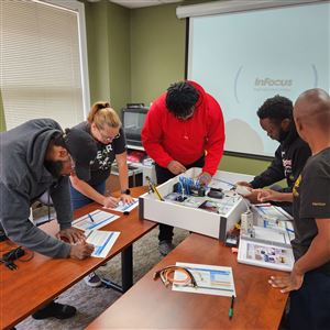 The Gismondi Job Training Program is a 12-week course teaching the ins and outs of telecommunication technologies, including copper and fiber optics cabling systems, wireless systems, and grounding.