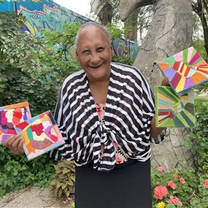 Charmette Young with her art at VaultArt Studio.  