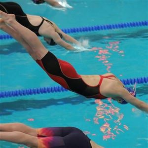 Mount Pleasant's Lily King dives into the water at a meet last season. King might make a big splash this season by putting herself into the WPIAL record book.