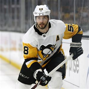 Penguins' Tristan Jarry, Jan Rutta back at practice, traveling with team  for West Coast swing