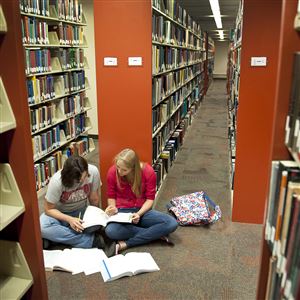 In a 2017 photo, students working inside the  Patrick J. Stapleton Jr. Library at Indiana University of Pennsylvania.