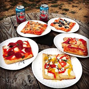 An array of thin Sicilian pizza slices from Slice Island at the Spirit Lodge in Lawrenceville. 
