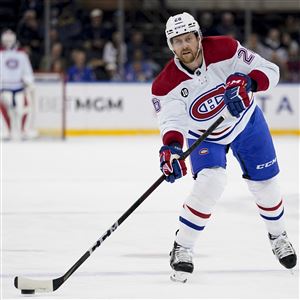 Former Montreal Canadiens defenseman Jeff Petry (26) passes the puck during the third period of a game against the New York Rangers in April. 