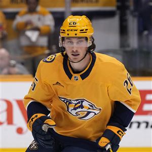 Nashville Predators center Philip Tomasino (26) plays during the first period of an NHL hockey game against the Edmonton Oilers, Thursday, Oct. 17, 2024, in Nashville, Tenn.