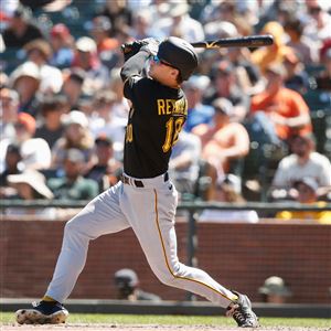 Outfielder Jason Bay of the Pittsburgh Pirates warms up before