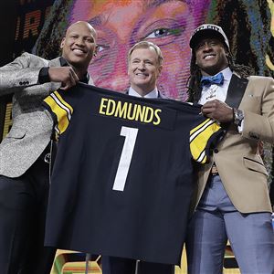 Ryan Shazier, left, poses with NFL commissioner Roger Goodell, center, and Steelers selection Terrell Edmunds of Virginia Tech inthe first round of the NFL draft, Thursday in Arlington, Texas.