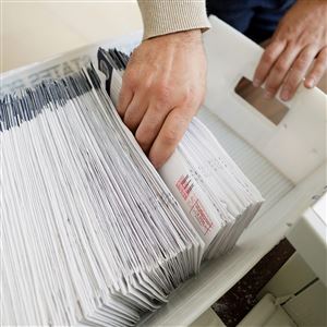 Mail ballots are sorted and counted by workers on Election Day 2020 in Northampton County.   