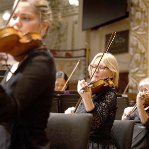 The violinists of the Pittsburgh Symphony Orchestra in concert at Heinz Hall in September 2024.
