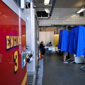 A voter casts his ballot in the Pennsylvania primary at a polling place inside a firehouse in Philadelphia Tuesday. 