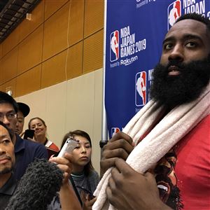 US player James Harden, right, of the National Basketball Association's Houston Rockets speaks to the media after a training session in Tokyo on October 6, 2019, ahead of their exhibition games against NBA champions Toronto Raptors. 