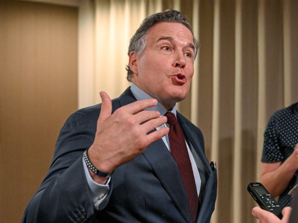 U.S. Sen. Dave McCormick speaks to press following a luncheon with leaders of the Pittsburgh Regional Building Trades Council at Rico’s restaurant in Ross Township on Friday, April 25, 2025.