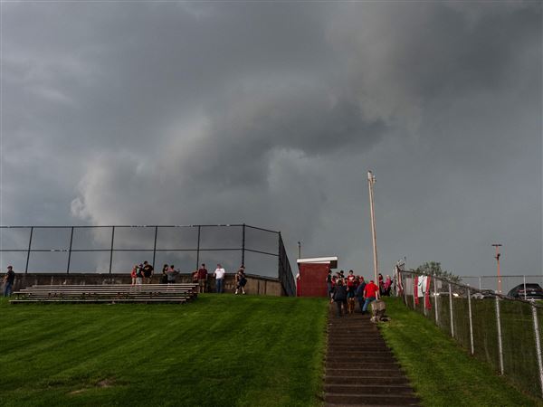 Dark clouds hover above the California-Fort Cherry High School baseball game April 29, 2025. The National Weather Service issued a tornado watch for much of Western Pa. as severe storms moved into the region on May 21.