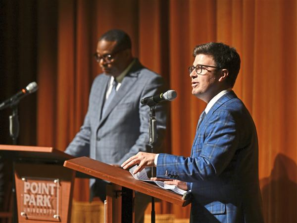 Allegheny County Controller Corey O’Connor speaks on stage with Mayor Ed Gainey at the Pittsburgh Mayoral Candidate Forums at the Pittsburgh Playhouse on Forbes Ave. Downtown on Tuesday, April 29, 2025.  