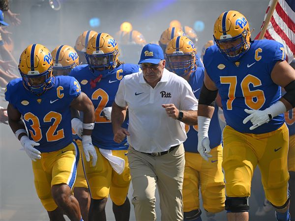 Head coach Pat Narduzzi of the Pittsburgh Panthers leads the Panthers onto the field before the game against the Wofford Terriers at Acrisure Stadium on September 2, 2023 in Pittsburgh, Pennsylvania.