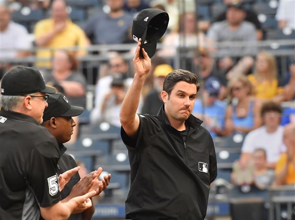 MLB umpire John Tumpane rescues woman on bridge