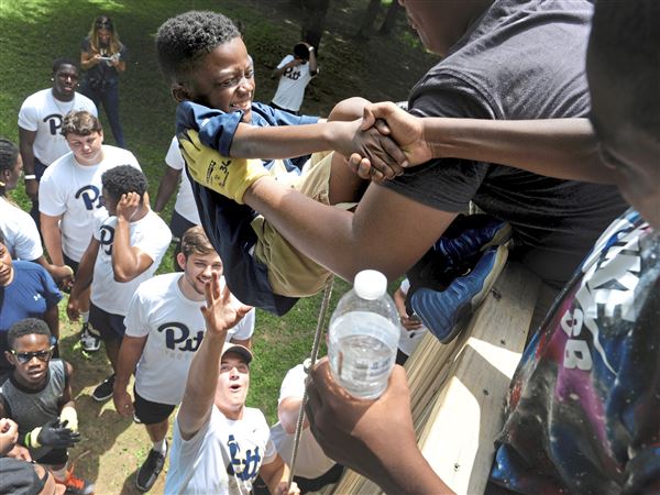 At Mel Blount Youth Home, Todd Sibley and fellow Pitt freshmen are