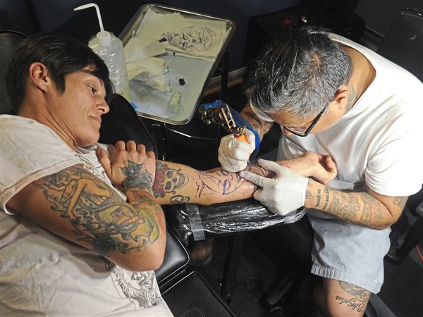 Tattoos once fringe now near ubiquitous  Pittsburgh PostGazette