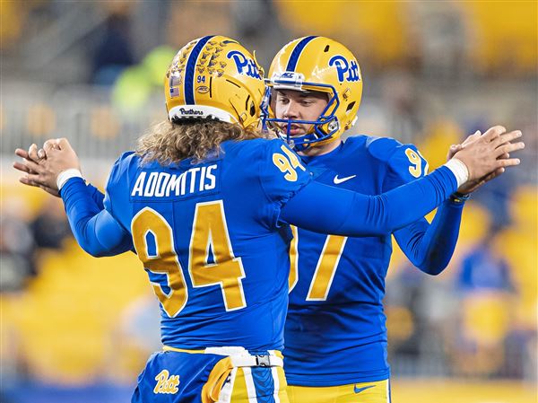 Snapping, serving and the WWE? The lowdown on Cal Adomitis, Pitt's  fifth-year starter