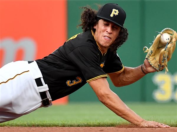 Pirates shortstop Cole Tucker steals everyone's girlfriend with majestic  head-first slide into second base, This is the Loop