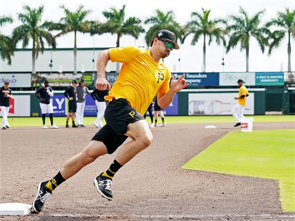 Behind Bryan Reynolds 'Matrix' slide, Pirates get call at plate to beat  Braves for series split