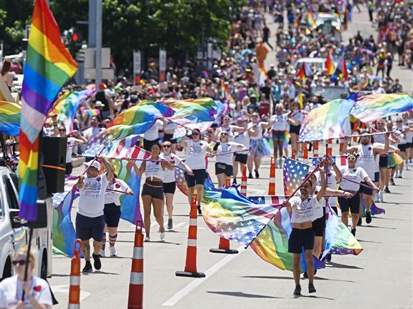 Members of the Pittsburgh Pride Color Guard march in the Pride Downtown on Saturday, June 1, 2024. 