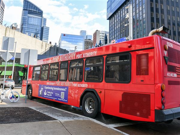 A Pittsburgh Regional Transit bus drives through Downtown on Thursday, March 20, 2025. PRT is preparing to install five bright red bus lanes Downtown next week, which could cause traffic issues.