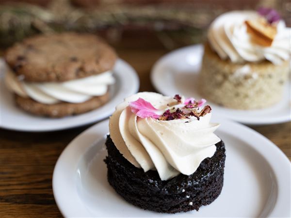 Vegan chocolate tea cake, front, a chocolate chip cookie sandwich and an Earl Grey blood orange tea cake are among the current offerings at the Butterwood Bake Consortium. 