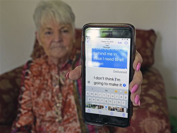 Cathy Stevenson shows one of the last texts she received from her husband, George, a West Virginia miner who died two years ago at the age of 74 while fighting black lung. "I don't think I'm going to make it," he wrote.