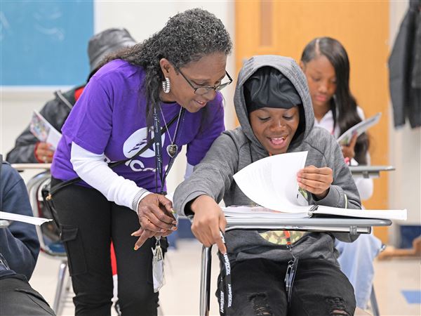 AmeriCorps member assists a student with schoolwork at Homewood Children's Village. Last week, a federal judge ruled that the Trump administration must restore AmeriCorps grant funding, offering long-awaited relief.  