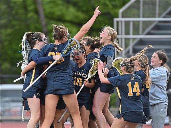 Mt. Lebanon players celebrate their 15-14 win over Pine-Richland in the 3A WPIAL girls lacrosse championship at Upper St. Clair on Thursday, May 22, 2025. Mt. Lebanon earned a 15-14 come-from-behind win claim the title.   