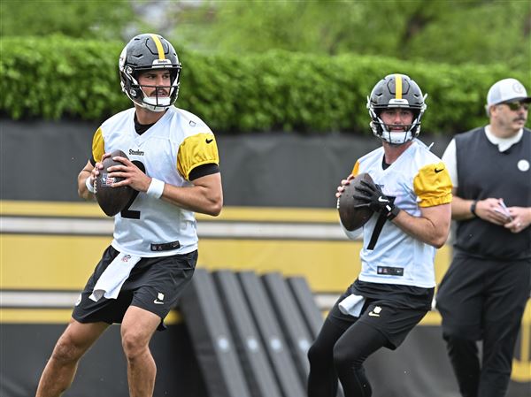 Steelers quarterbacks Mason Rudolph (2) and Skylar Thompson (17) throw a passes during the first day of Steelers Minicamp at the UPMC Rooney Sports Complex on the South Side on Tuesday May 27, 2025. 