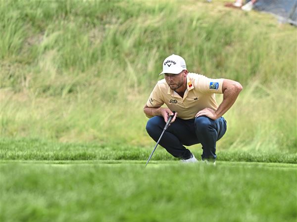 Sam Burns lines up a putt at the U.S. Open at Oakmont Country Club on Friday, June 13, 2025.   