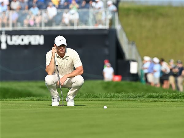 Rory McIlroy puts off of hole 12 on the first official day of the 125th U.S. Open Championship in Oakmont on Thursday, June 12, 2025.