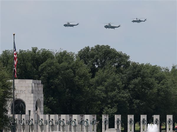Aircraft traveling alongside Marine One with U.S. President Donald Trump pass by the World War II Memorial ahead of the Army's 250th birthday parade and celebration around the White House on June 9, 2025 in Washington.