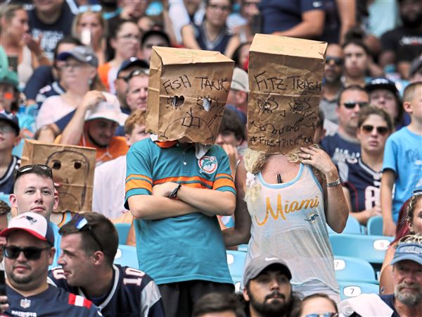 Bag-Headed Sports Fans Who Love Awful Teams