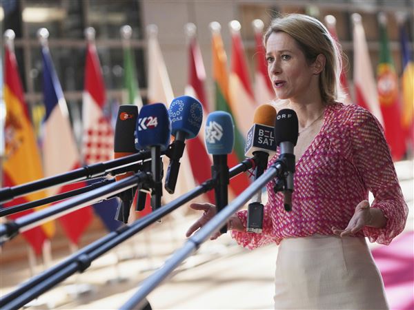 European Union foreign policy chief Kaja Kallas speaks with the media Tuesday as she arrives for a meeting of EU defense ministers at the European Council building in Brussels.