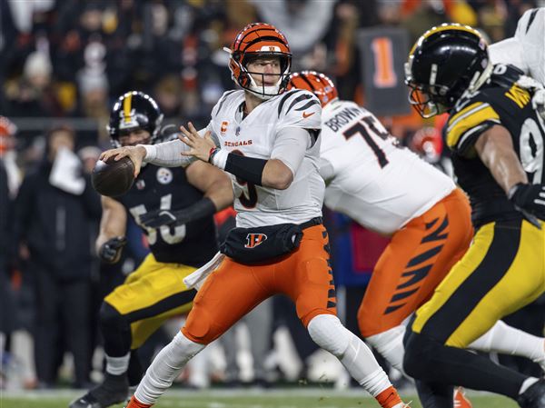 Cincinnati Bengals quarterback Joe Burrow (9) looks to throw during an NFL football game, Saturday, Jan. 4, 2025, in Pittsburgh. 