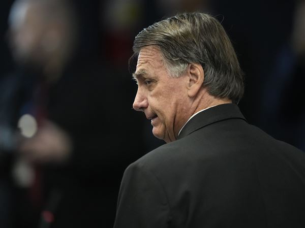 Former Brazilian President Jair Bolsonaro attends his Supreme Court trial along with others charged in an alleged coup plot to keep him in office after his 2022 election defeat, in Brasilia, Brazil.