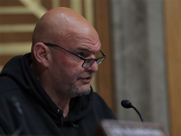 Sen. John Fetterman, D-Pa.,  speaks during a hearing with the Senate Committee on Homeland Security and Governmental Affairs on Capitol Hill on Tuesday in Washington. 