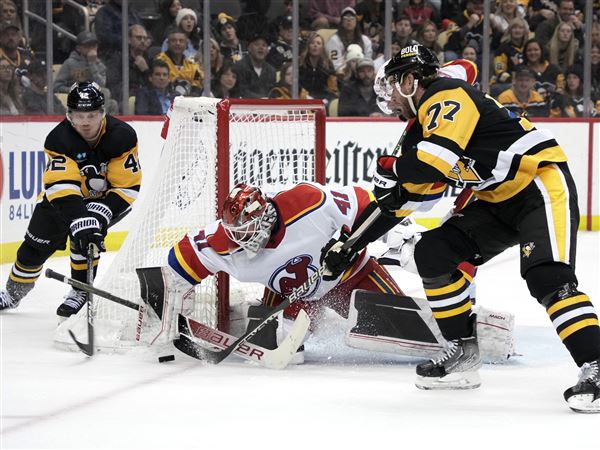 PENGUINS SURGE PAST WOLF PACK FOR 4-2 WIN